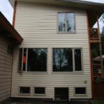 Side view of a house with newly installed windows