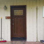 Front porch of a house with a newly installed door