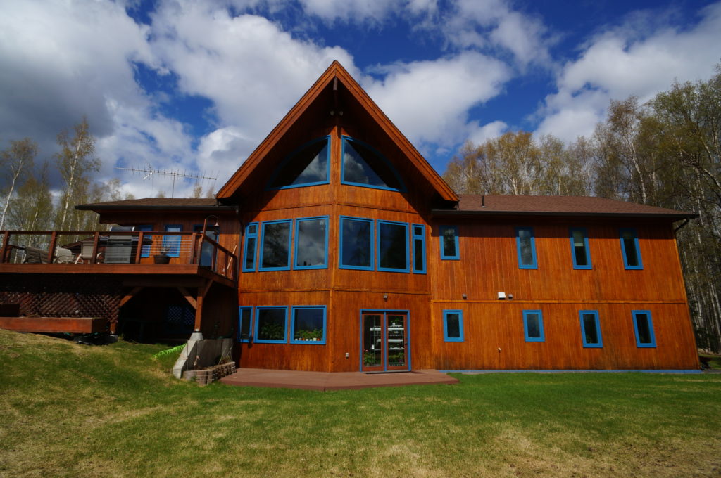 Exterior of house with newly installed Vinyltek windows