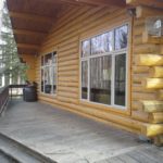 Alaskan log home with new large windows