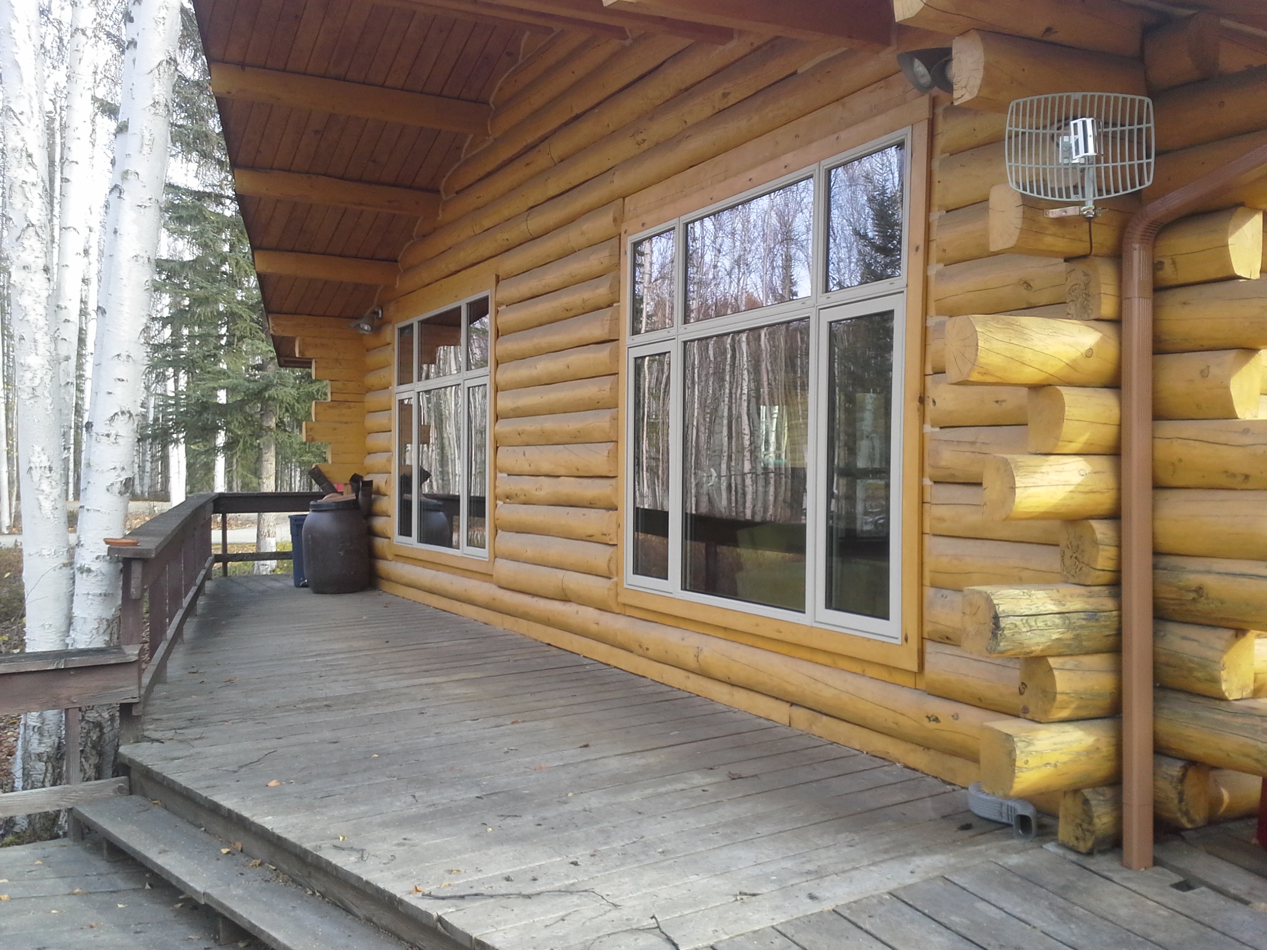 Alaskan log home with new large windows